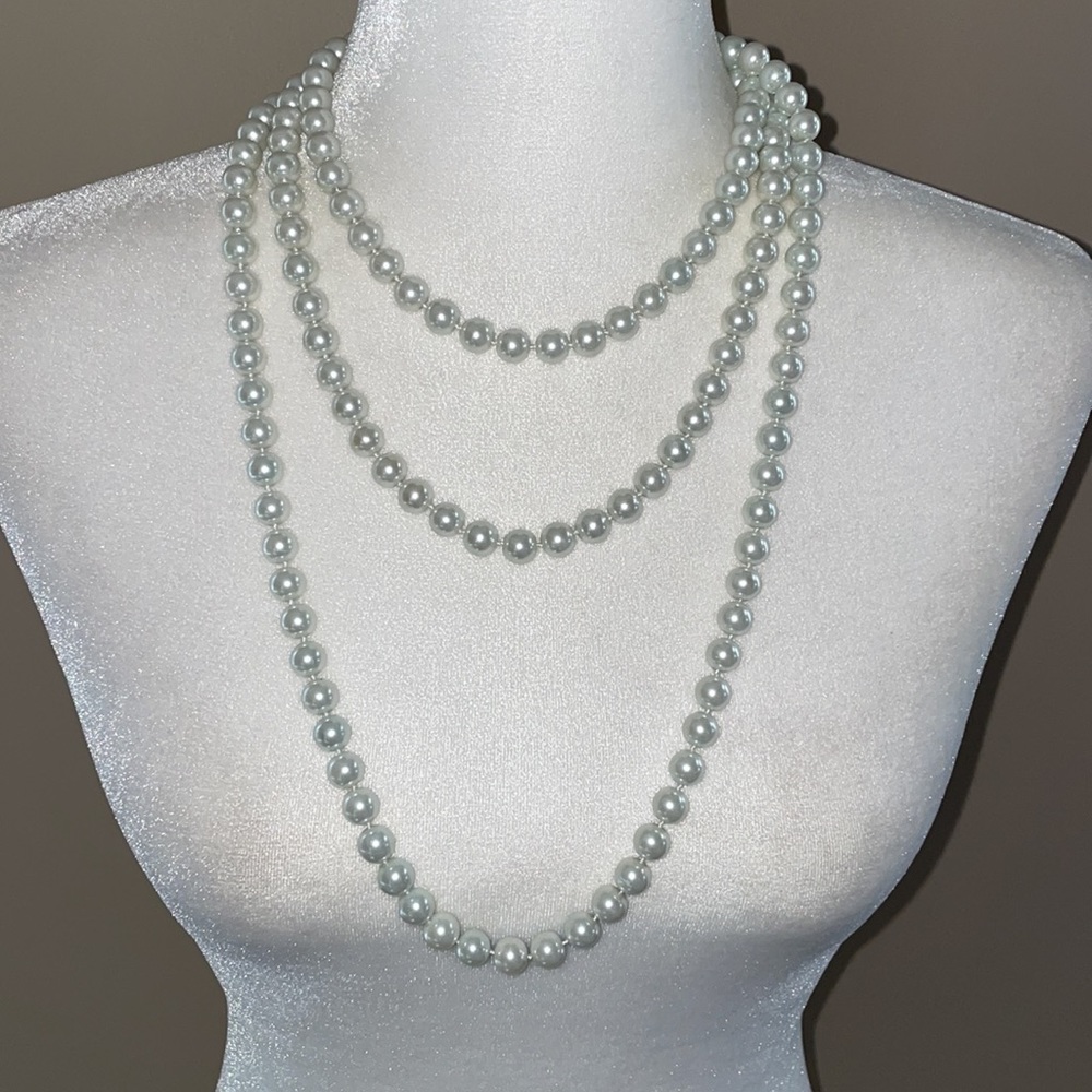 White Faux Long Strand of Pearls